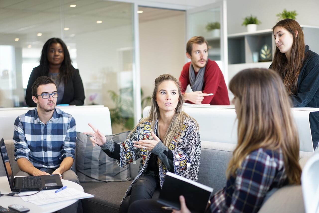 Team of event organisers in an Event Post-Mortem Meeting