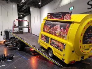 Unloading Yellow Submarine two tonne food container 